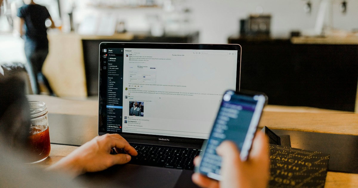 Facebook Page Professional Dashboard on a laptop showing monetization settings and content performance metrics for 2026